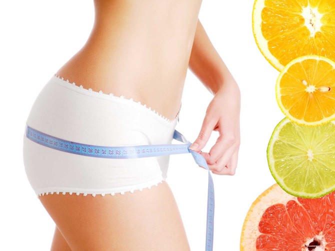 3766_dijeta-stock-photo-woman-measuring-perfect-body-after-dieting-on-citrus-fruits-shutterstock_32863591