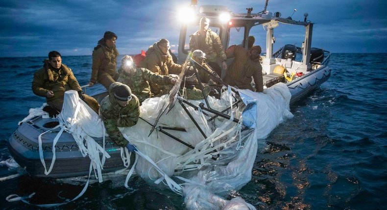 US Navy officers recovered a high-altitude surveillance balloon on February 5 off the coast of South Carolina.