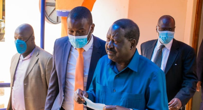 ODM party leader Raila Odinga with Secretary-General Edwin Sifuna