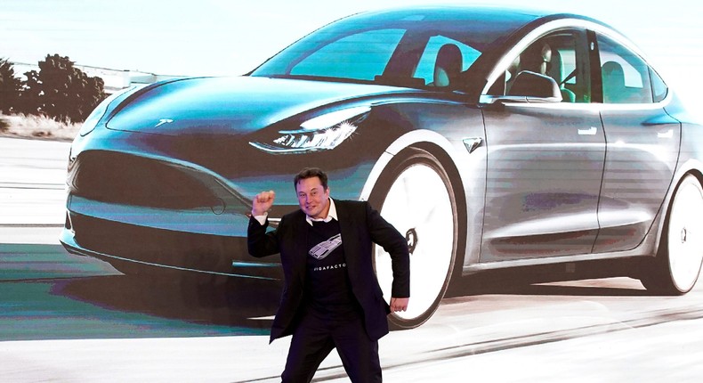 Tesla Inc CEO Elon Musk dances onstage during a delivery event for Tesla China-made Model 3 cars in Shanghai, China January 7, 2020.
