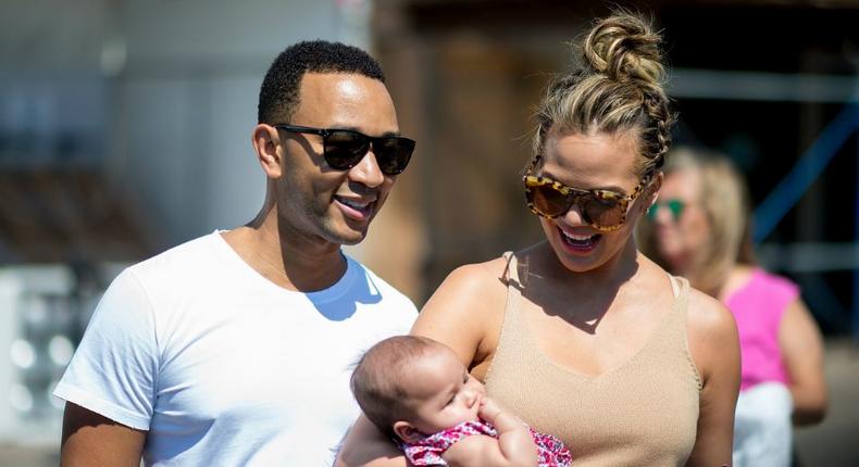 Singer John Legend, his wife Chrissy and baby Luna.