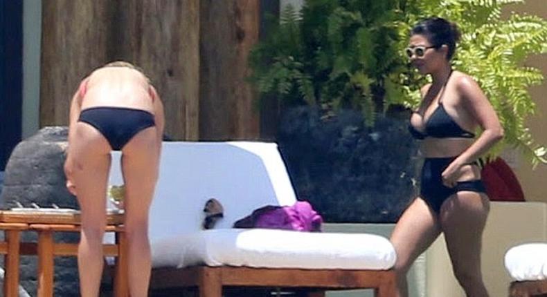 Kourtney Kardashian spotting a black bikini and high waist in Mexico