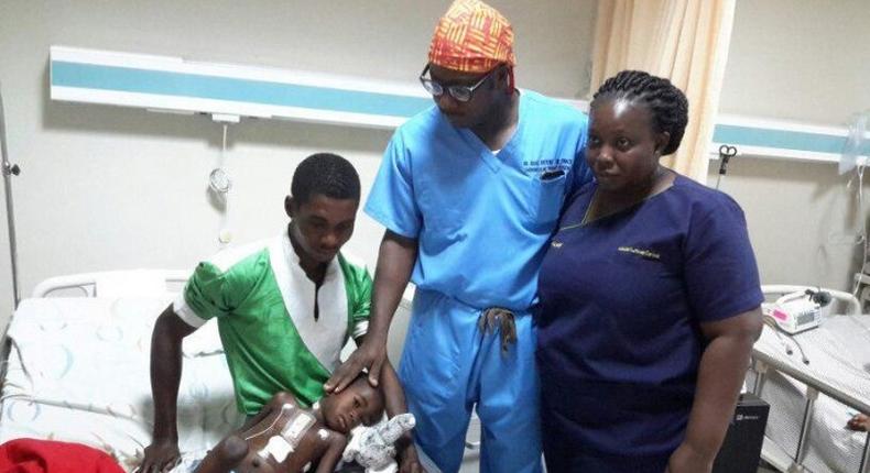 Dr Isaac Okyere attending to one of the seven children who underwent the open heart surgery 