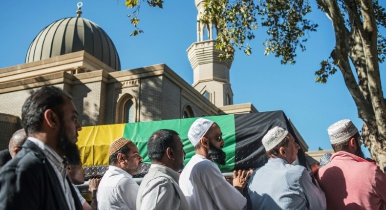 The coffin of South African anti-apartheid activist Ahmed Kathrada is carried to Masjidul Furkaan in Houghton during his wake on March 29, 2017