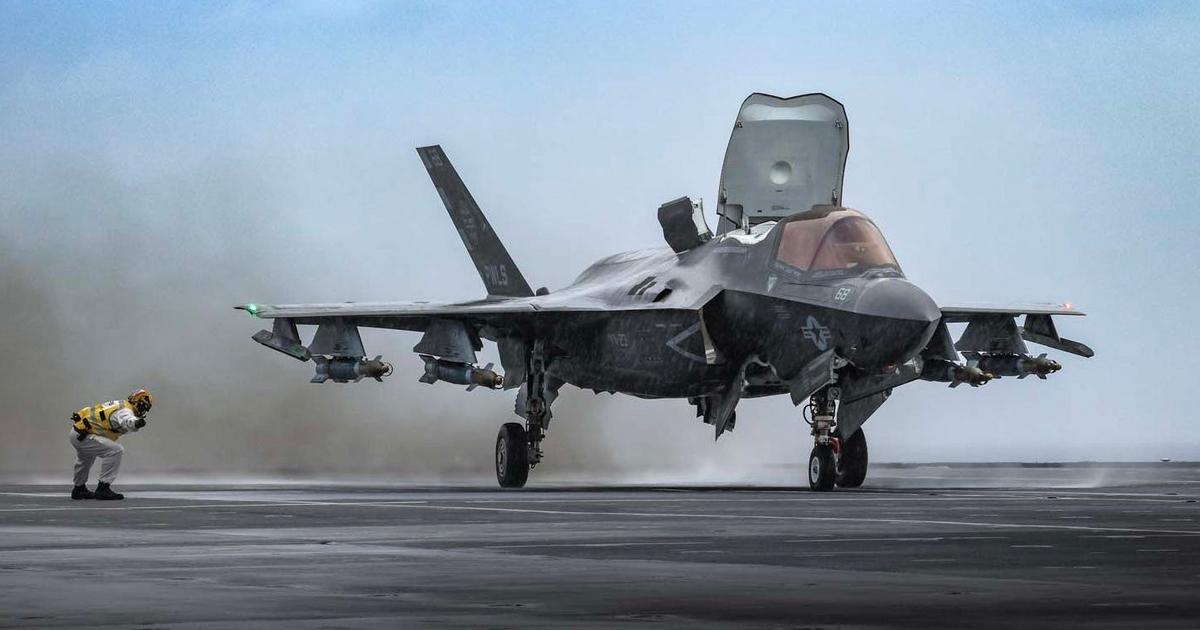 The British navy's newest aircraft carrier teamed up with US pilots to ...