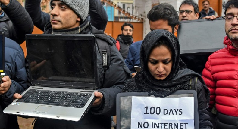 Dozens of journalists held a silent demonstration against the internet ban in Kashmir