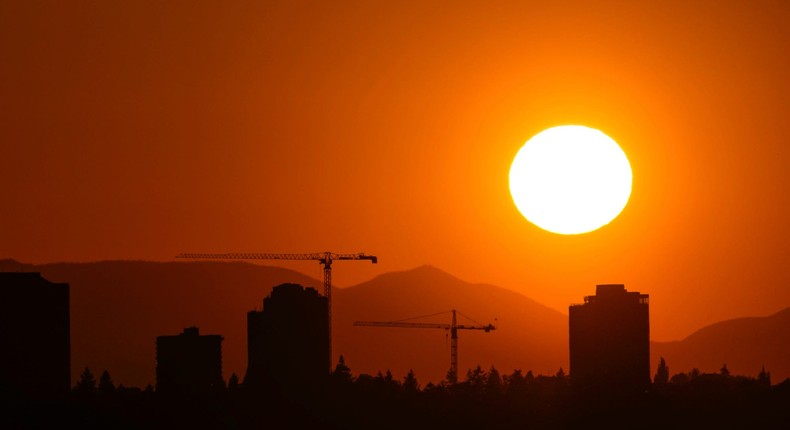 The sun sets over the University District in Seattle on May 13, 2023, while a heat advisory is in effect.Lindsey Wasson/AP Photo