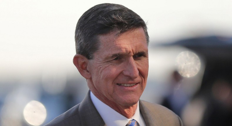 U.S. National Security Advisor Michael Flynn boards Air Force One at West Palm Beach International airport in West Palm Beach, Florida U.S., February 12, 2017.