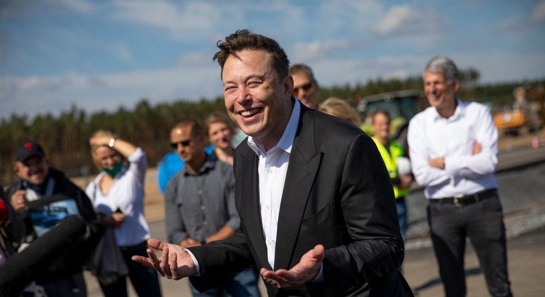 Tesla head Elon Musk talks to the press as he arrives to to have a look at the construction site of the new Tesla Gigafactory near Berlin on September 03, 2020 near Gruenheide, Germany.