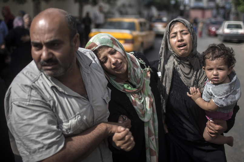 W izraelskich nalotach zginęło już ponad 300 Palestyńczyków EPA/OLIVER WEIKEN