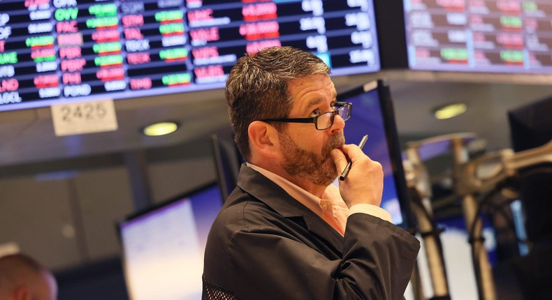 Traders work the floor of the New York Stock Exchange during morning trading on May 05, 2022 in New York City. Stocks opened lower this morning after closing high on Wednesday after the Federal Reserve announced an interest-rate hike by half a percentage point in an effort to further lower inflation.Michael M. Santiago/Getty