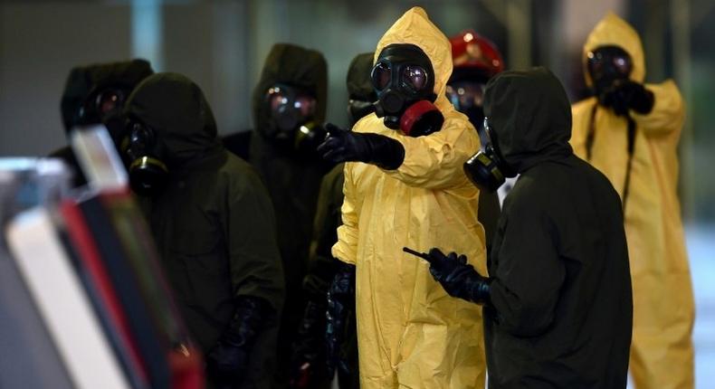 Malaysia's Hazmat team conducts a decontamination operation at the Kuala Lumpur International Airport on February 26, 2017 where Kim Jong-Nam, the half-brother of North Korean leader Kim Jong-Un, was killed