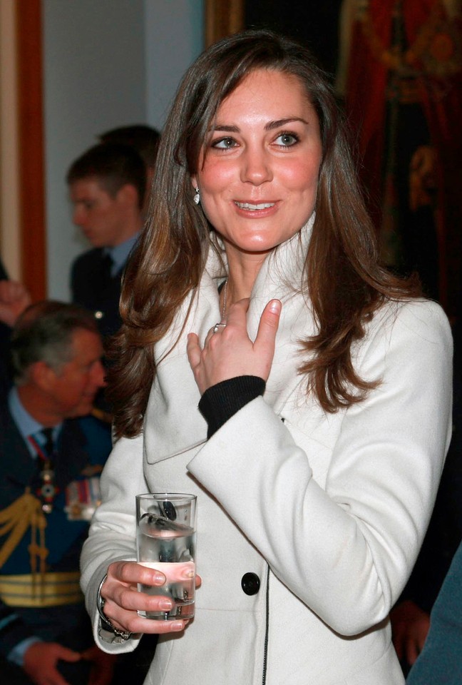 File photograph shows the girlfriend of Britain's Prince William, Kate Middleton, leaving after the wedding of Laura Parker