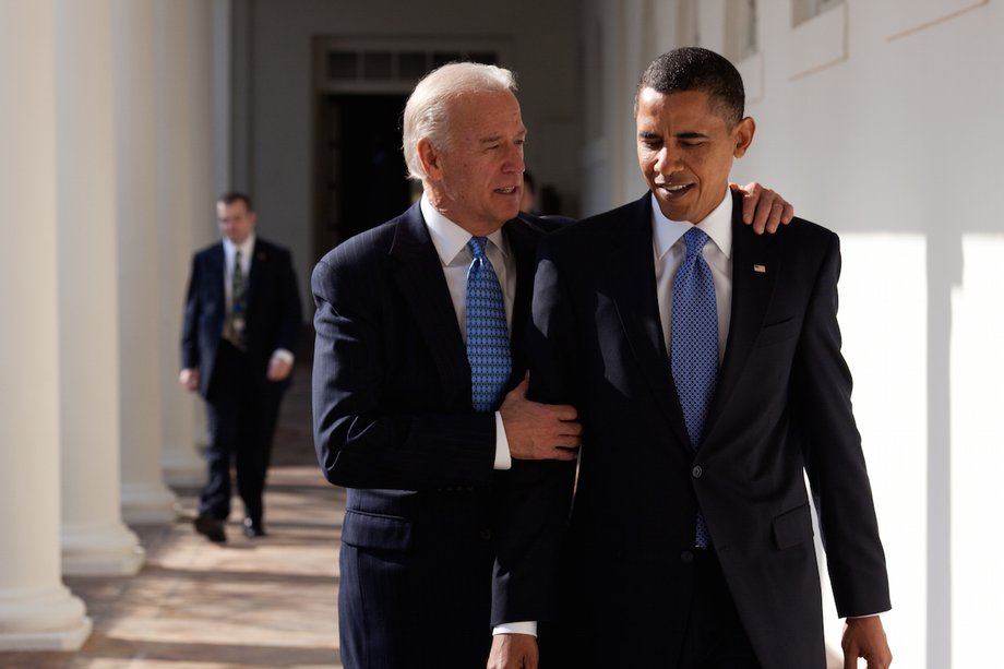 Obama walks with Biden along the Colonnade.