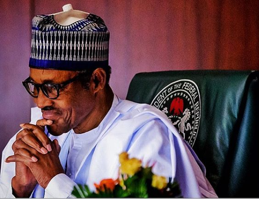 President Muhammadu Buhari smiles during FEC meeting [Twitter/@BashirAhmaad] 