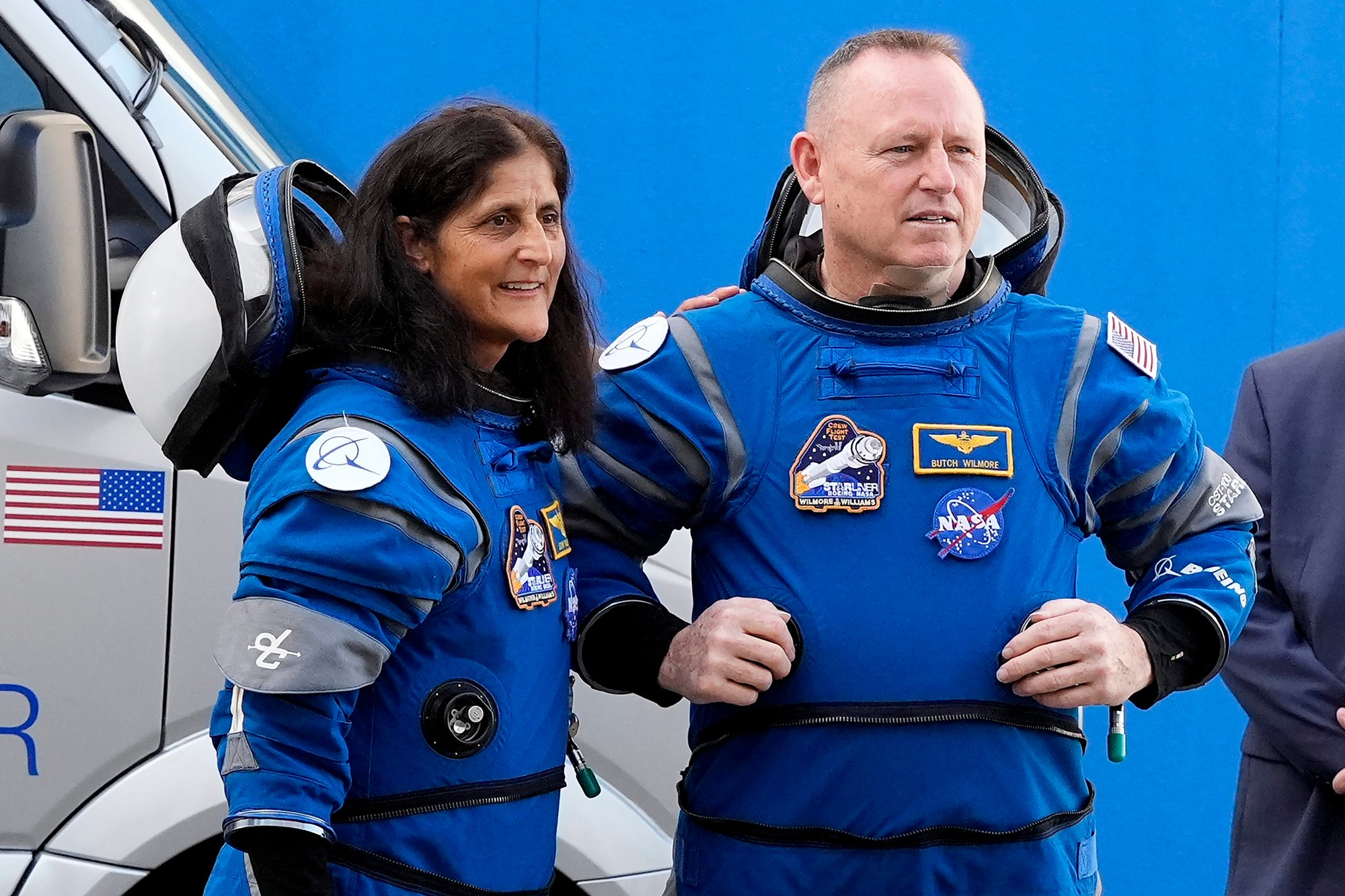 Posádka vesmírnej lode Boeing CST-100 Starliner.