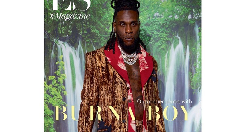 Burna Boy is  wearing two coats, a Monad coat underneath a Jordan Luca coat and the Jewellery is Burna Boy’s own [instagram/es]