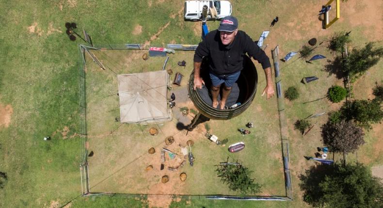 Two decades on from his initial effort, Kruger, 52, is on the verge of smashing his record for sitting in a pole 25 metres above the ground