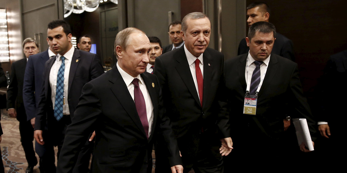 Turkey's President Tayyip Erdogan (2nd R) walks with his Russian counterpart Vladimir Putin prior to their meeting at the Group of 20 (G20) leaders summit in the Mediterranean resort city of Antalya, Turkey, November 16, 2015.