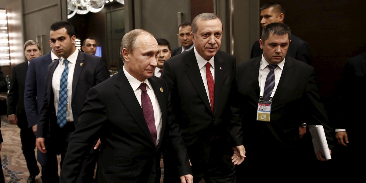 Turkey's President Tayyip Erdogan (2nd R) walks with his Russian counterpart Vladimir Putin prior to their meeting at the Group of 20 (G20) leaders summit in the Mediterranean resort city of Antalya, Turkey, November 16, 2015.