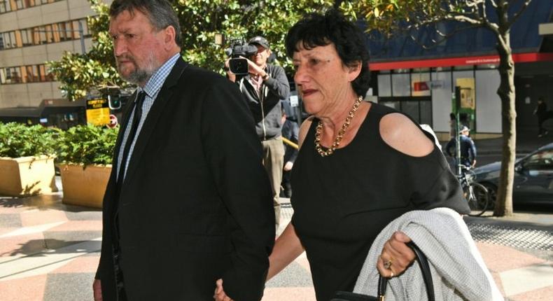 Greg and Virginia Hughes, the parents of Australian cricketer Phillip Hughes, arrive at an inquest into his death in Sydney on October 14, 2016