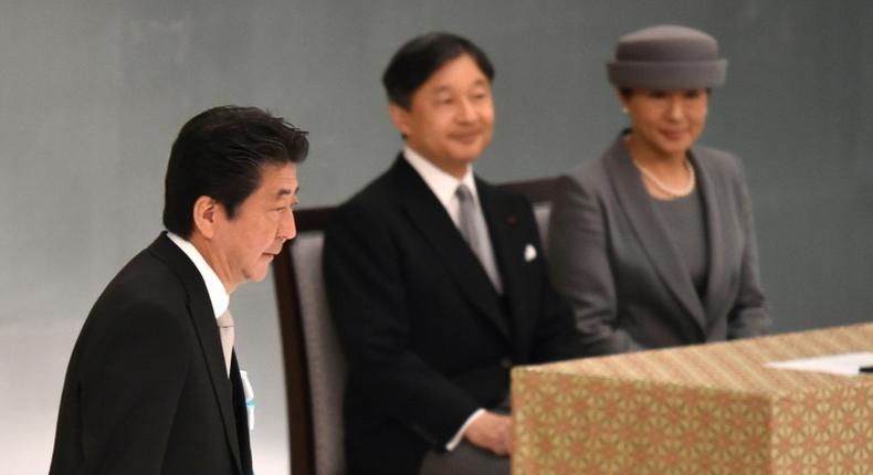 Abe and Naruhito stuck closely to their prepared remarks