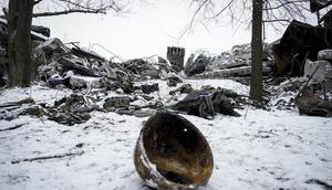 A Russian soldier's helmet lies amid rubble in Makiivka, Ukraine. Russia is continuing to send troops into high casualty, head-on, meat grinder assaults.Anadolu via Getty Images