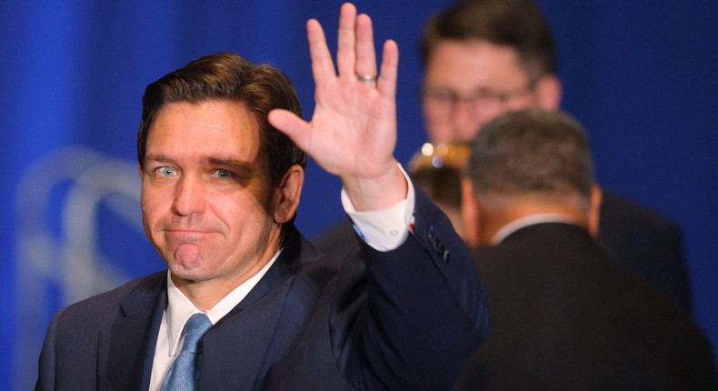 Florida Gov. Ron DeSantis waves to the crowd outside the 2023 NHGOP Amos Tuck Dinner in Manchester, New Hampshire on April 14, 2023.REUTERS/Brian Snyder