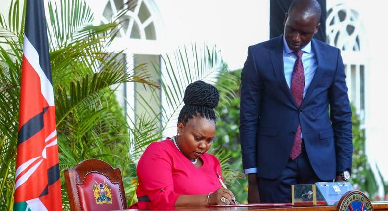 Interior CAS Millicent Omanga signs her oath of office at State House on March 23, 2023