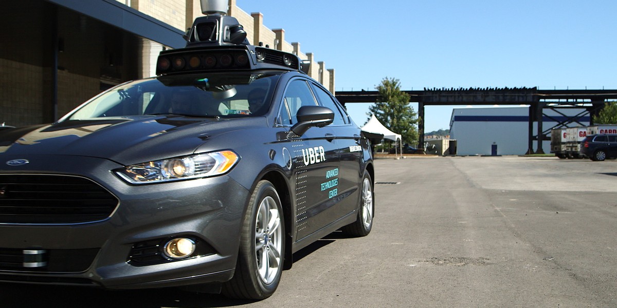 An Uber self-driving car with Lidar unit on the roof