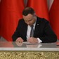 Warszawa, 30.01.2018. Prezydent Andrzej Duda podpisuje ustawę z dnia 10 stycznia 2018 r. o ograniczeniu handlu w niedziele i święta oraz niektóre inne dni, 30 bm. w Pałacu Prezydenckim w Warszawie. (awa) PAP/Rafał Guz