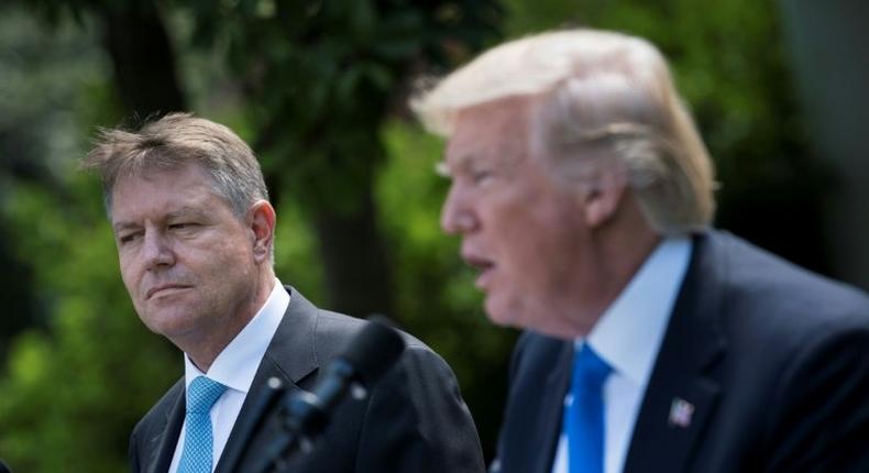 US President Donald Trump declared his support for NATO's mutual defense commitment in a press conference with Romania's President Klaus Iohannis.