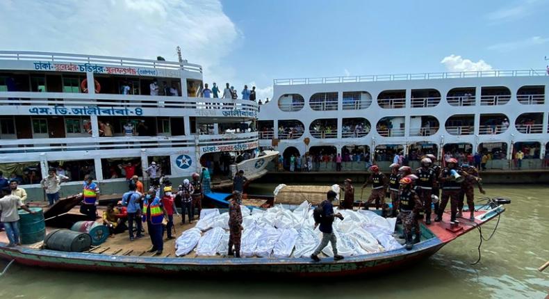 Divers were still pulling bodies from the wreck, with the deceased placed in body-bags and then laid in rows at the harbour-front