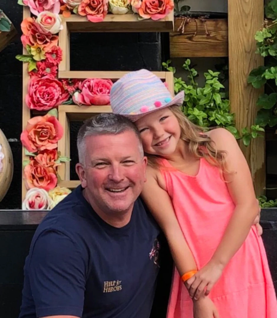 Džejson Hol sa ćerkom