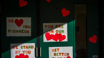 Messages of support for teacher Abigail Zwerner, who was shot by a 6-year-old student, grace the front door of Richneck Elementary School Newport News, Va., on Jan. 9, 2023.AP Photo/John C. Clark, File