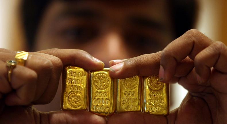 Gold is seen as a safe haven investment in uncertain times, a hedge against inflation and paper assets.
