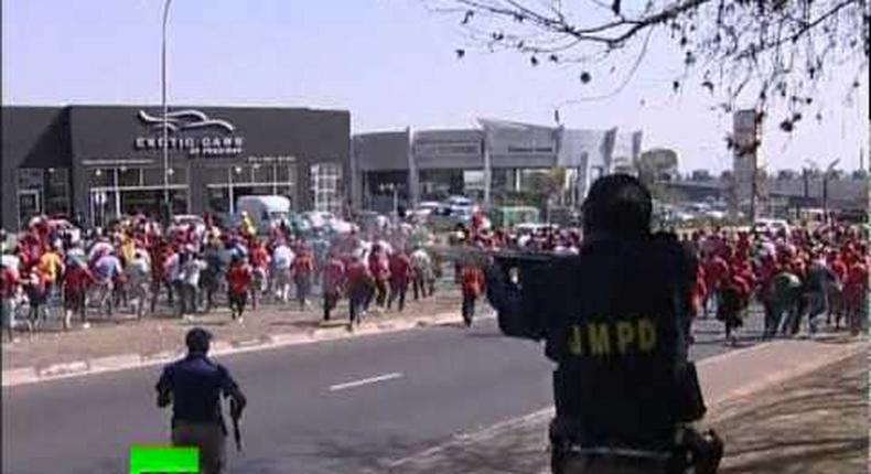 South African police fire rubber bullets at school protest