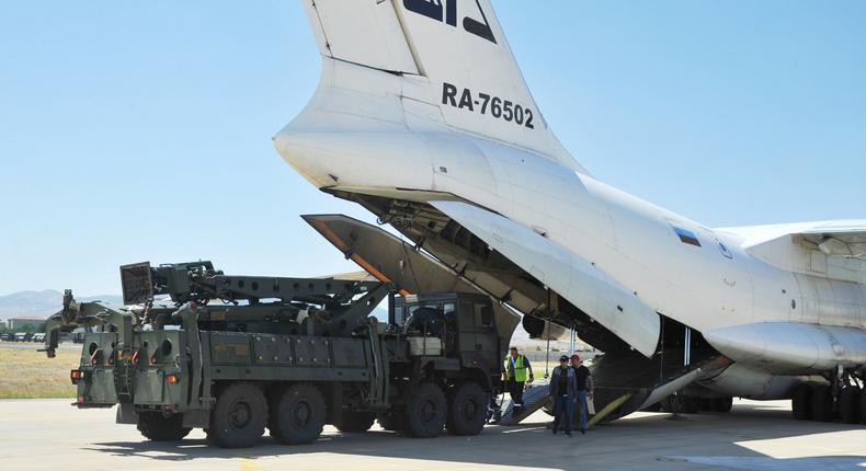 FILE PHOTO: Parts of a Russian S-400 defense system are unloaded from a Russian plane at Murted Airport near Ankara, Turkey, August 27, 2019. Turkish Military/Turkish Defence Ministry/Handout via REUTERS