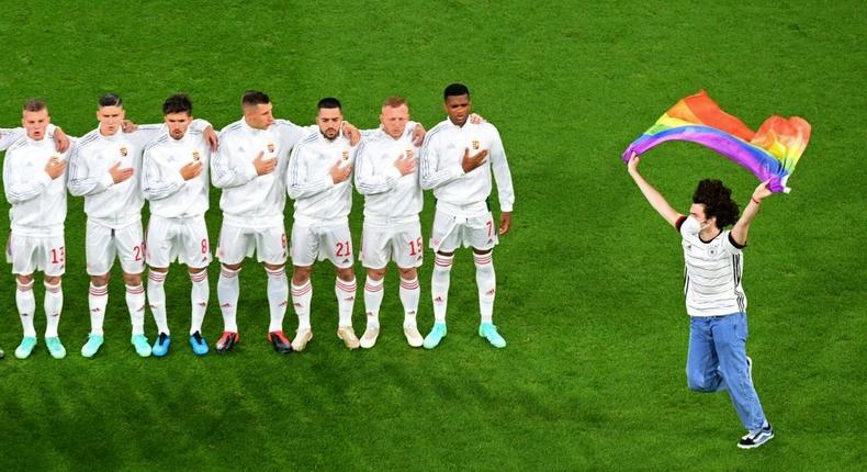 One fan invaded the pitch to brandish a rainbow flag Creator: Matthias Hangst