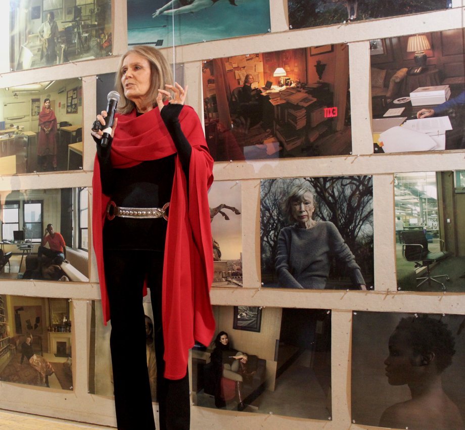 Political activist Gloria Steinem beside the exhibit, "Women: New Portraits" by Annie Leibovitz, in New York City.