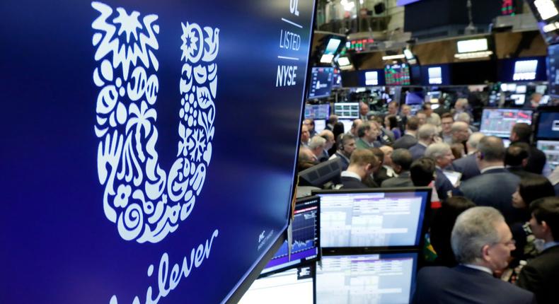 FILE - In this Thursday, March 15, 2018 file photo, the logo for Unilever appears above a trading post on the floor of the New York Stock Exchange. Consumer products giant Unilever said Thursday, June 25, 2020, it is aiming for a