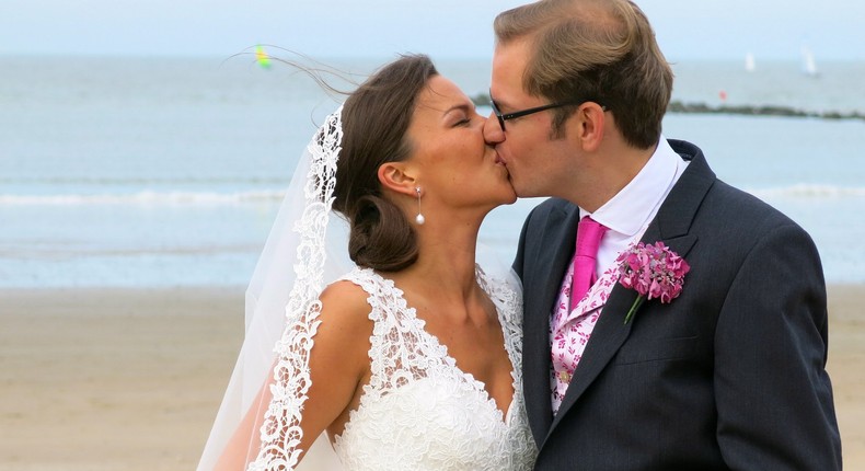 beach wedding bride groom kiss the bride