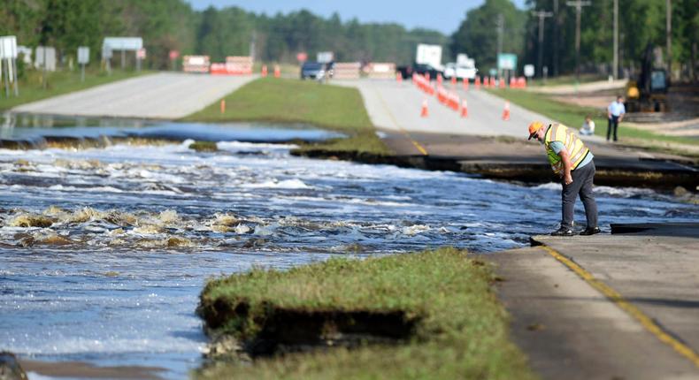 Flooding from Sutton Lake has washed away part of US 421 in New Hanover County just south of the Pender County line in Wilmington, North Carolina on Sept. 21, 2018.