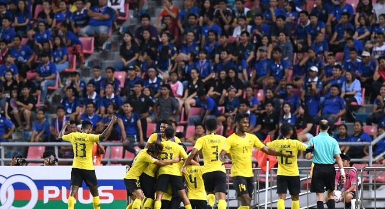 The away supporters were soon celebrating as Malaysia drew level before the half-hour