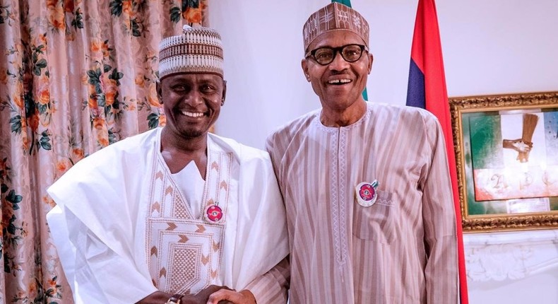 Gamawa Babayo shakes hands with President Muhammadu Buhari [Twitter/@ogundamisi]