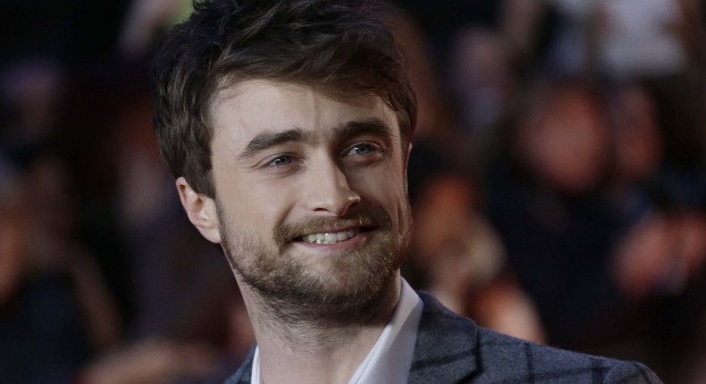 Daniel Radcliffe doesn't look like he's wearing product in this picture, but we bet you he's wearing some form of hair wax.