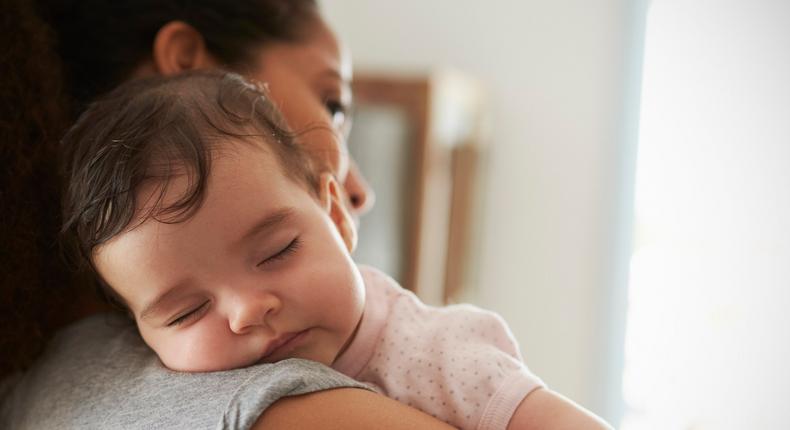 mother and sleeping baby