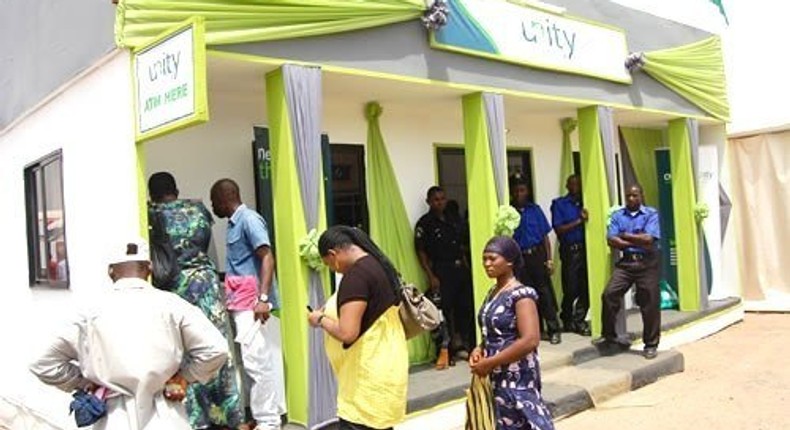 Customers using Unity Bank Plc ATM 