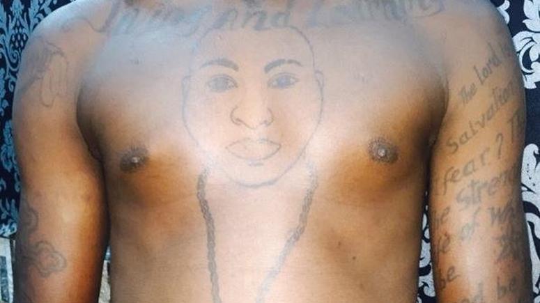 Crazy! Fan gets tattoo of pop superstar on his chest | Pulse Nigeria