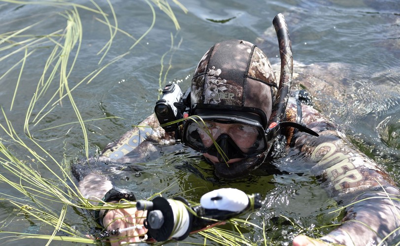 Władimir Putin w jeziorze